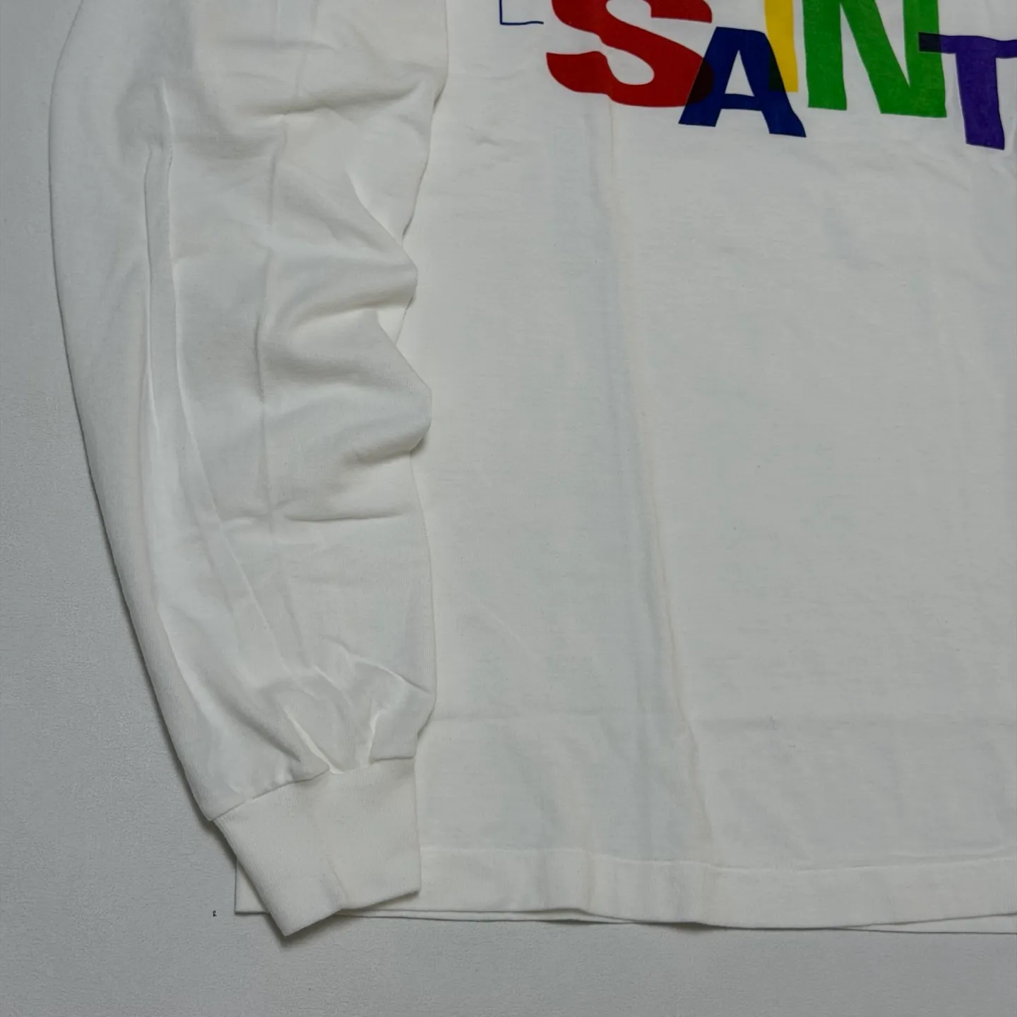 SAINT Mxxxxxx LS TEE/BEAUTIFUL SAINT/WHT Colorful SAINT slogan long-sleeved TEE White S-XL Cylindrical side seamless fabric Really made with care! Domestic printing factory OEM, original water slurry non-touch printing process, correct version, correct main mark/wash mark/little angel anti-counterfeiting mark